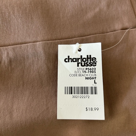 Mauve colored top and shorts.
Stretchy - Picture 11 of 12